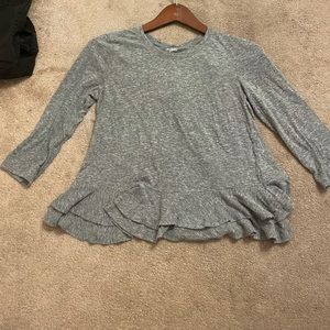 Alya women’s grey ruffle top in size XS.